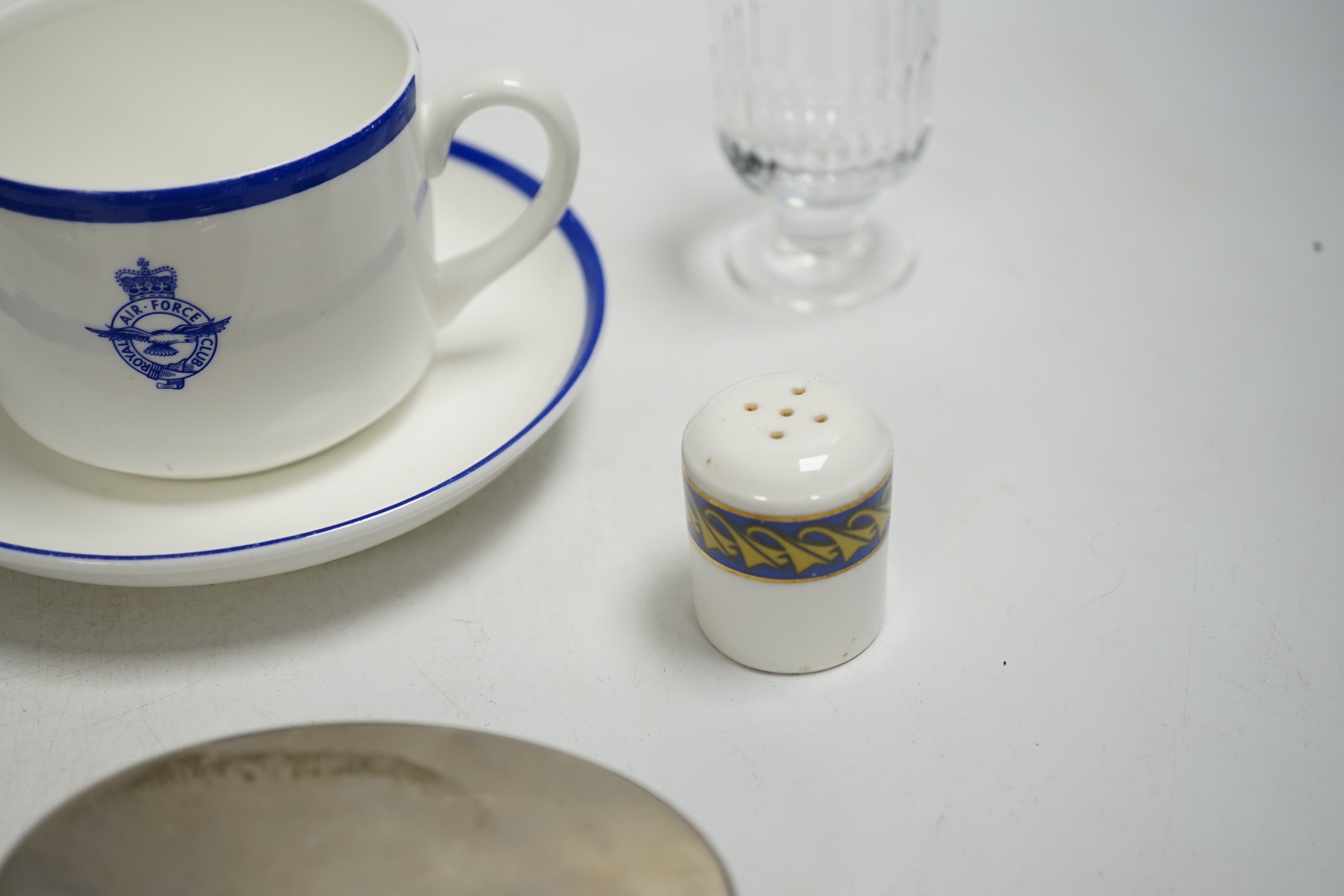 Concorde memorabilia comprising four British Airways glass tots, a pair of plated cased clothes brushes, three graduated scale models of Concorde and a bottle opener together with four Wedgwood Royal Air Force Club mugs